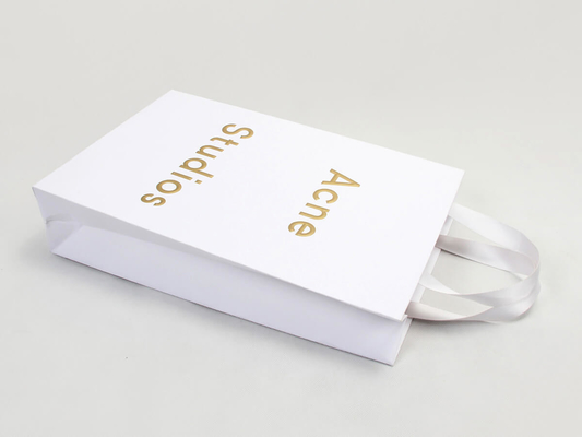 Bolsas de compras de ropa de papel teñido de lujo Bolsa de papel con estampado de letras