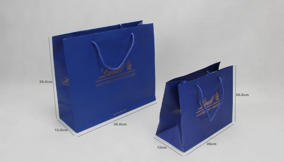 C1S C2S Bolsas de papel personalizadas recubiertas brillantes Bolsas de papel para compras de ropa azul marino